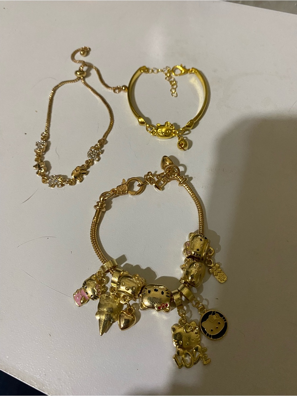 Hello Kitty Gold Charm Bracelet Set with Pink Accents